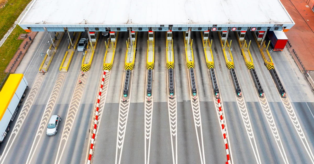 Aerial view of a motorway toll plaza — HU-GO is the road toll payment system in Hungary